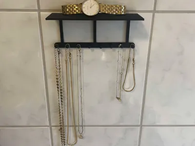 Jewelry holder with small shelf
