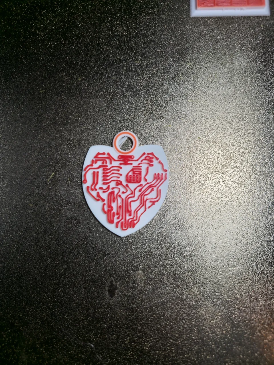 Circuit heart earring view 3