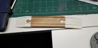 Wood train track ramp with hole