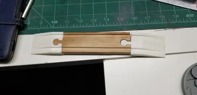 Wood train track ramp with hole