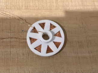 Wireless charging coil stencil