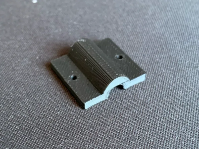 BLOCCA TUBO PTFE DA MURO
