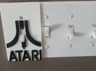 atari lightswitch cover