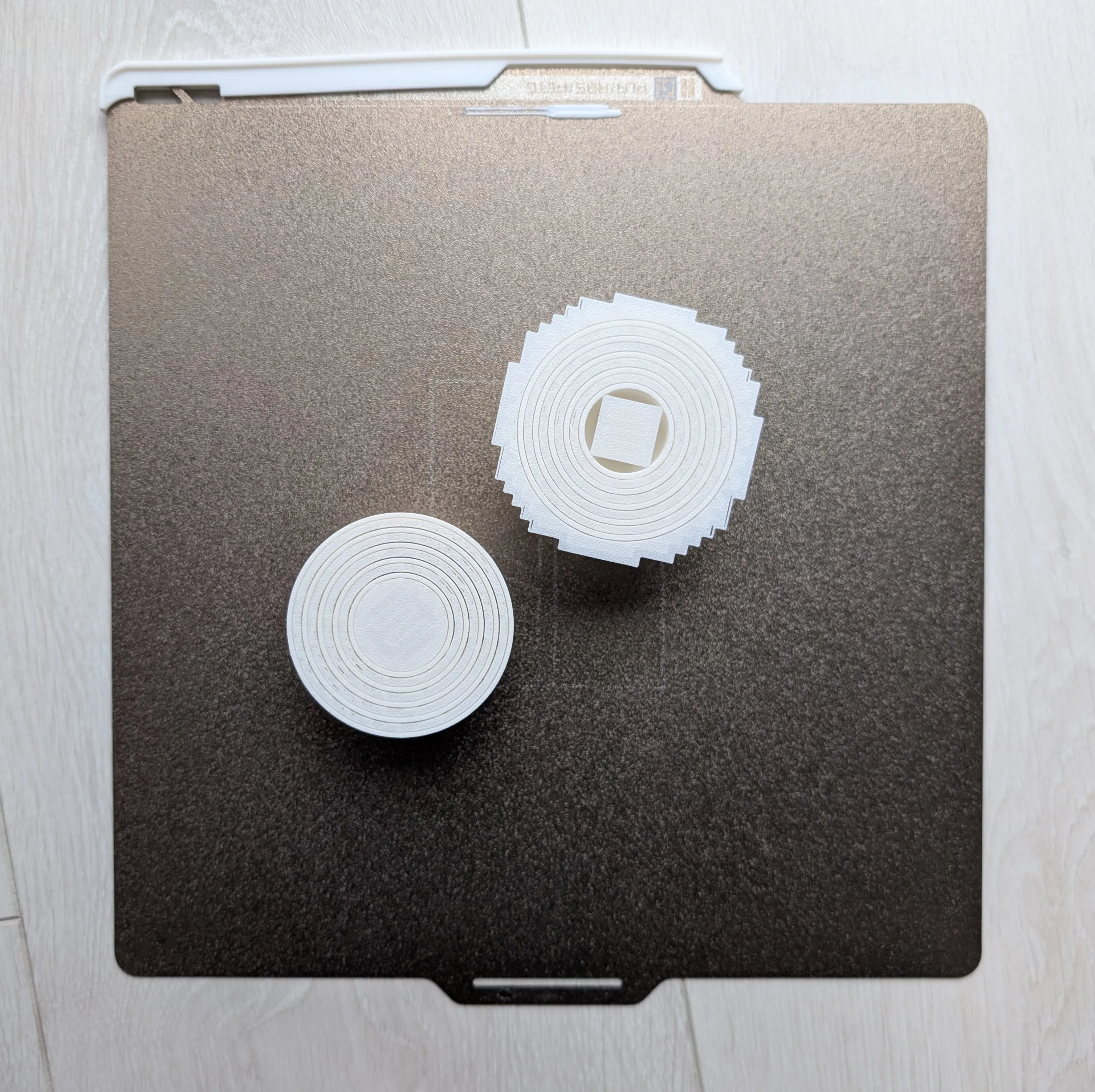 Once printed, the nested egg halves are stuck together and need to be separated by hand.