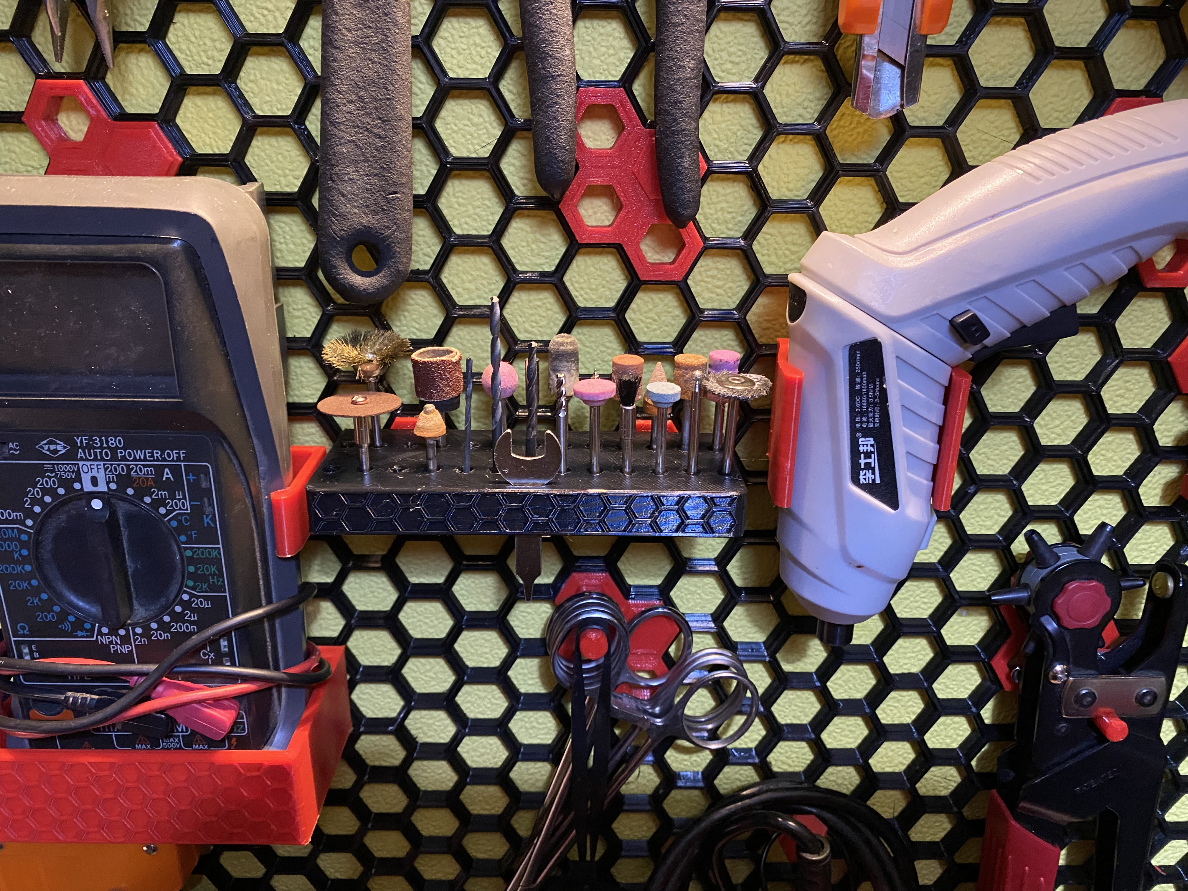 Dremel tool bit mount for Honeycomb wall