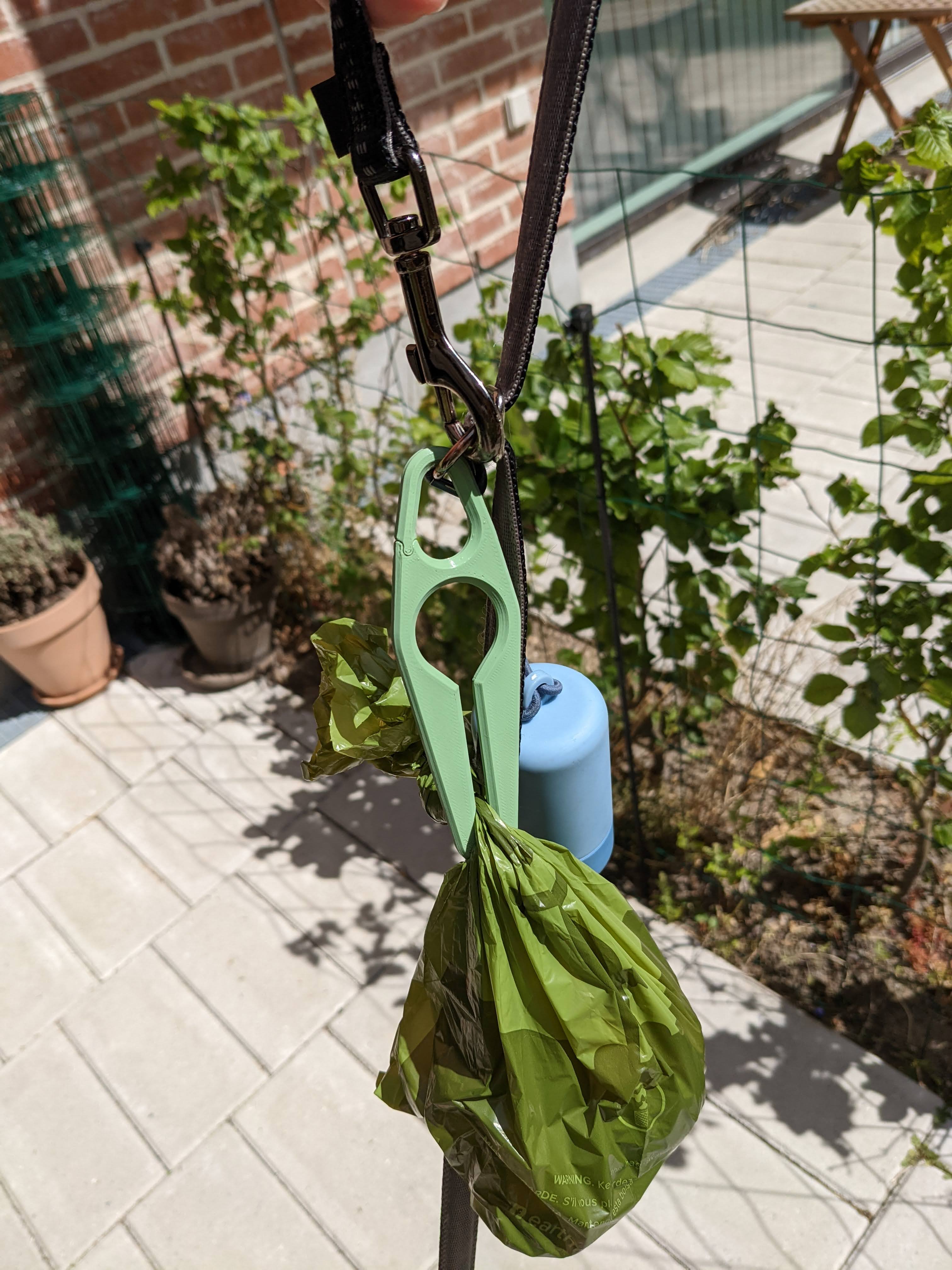 Poop bag holder for dog leash