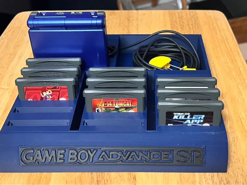 Game Boy Advanced SP and Accessory holder.