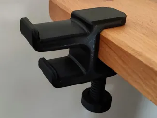 Headset holder with screw