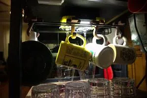 Cups from a rack

AI-generated content may be incorrect.