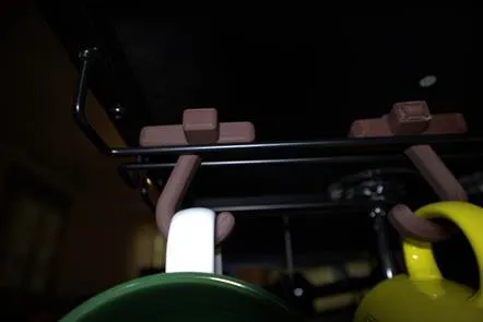 Close-up of a rack with a couple of objects

AI-generated content may be incorrect.