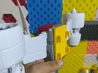Robot flyer and backpack holder for IKEA pegboard