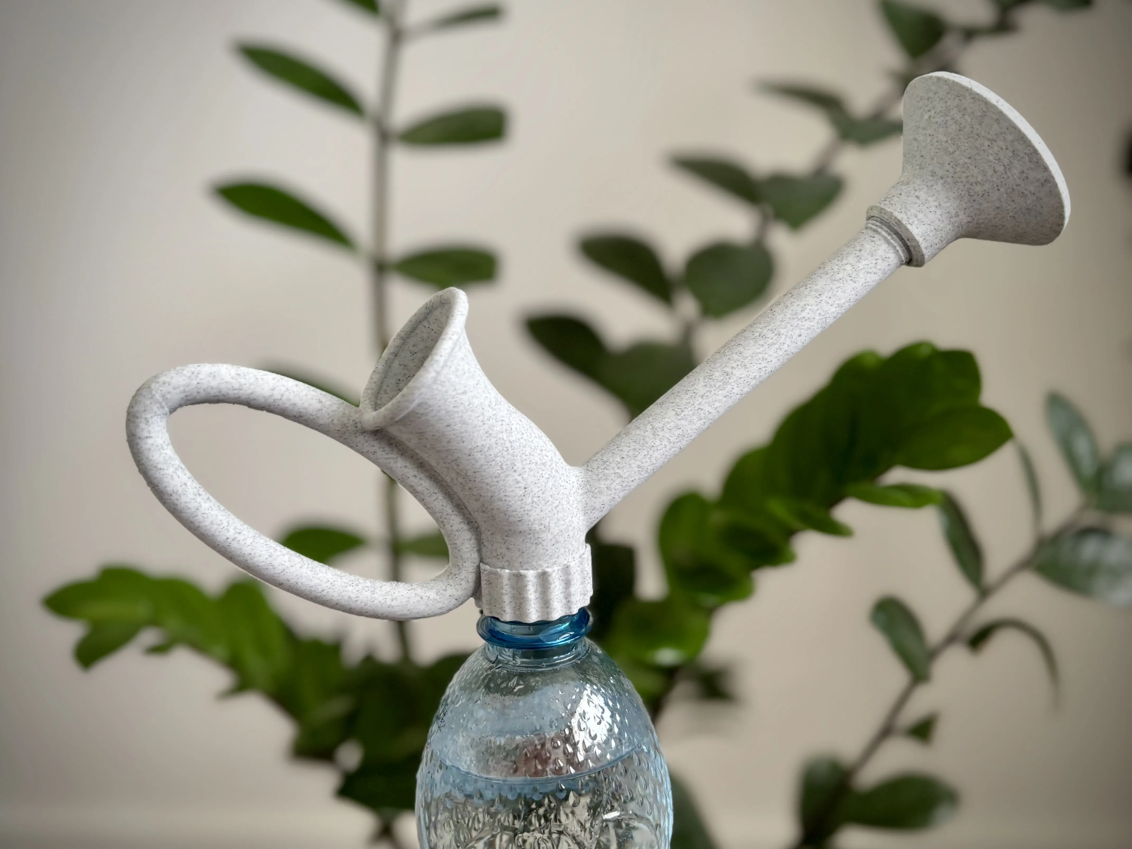 Watering bottle cup with funnel