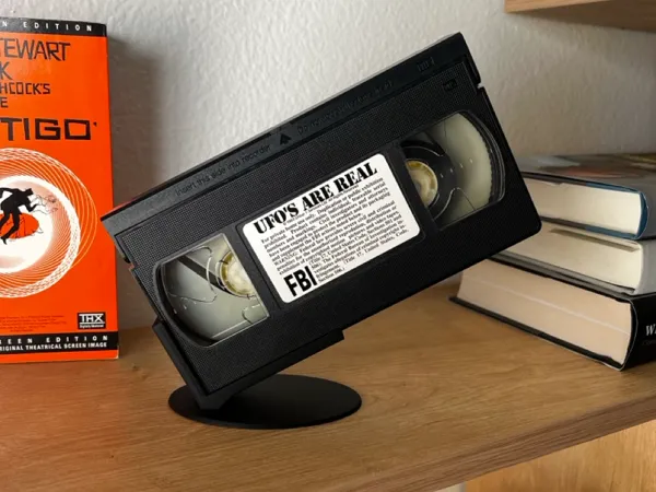 Présentoir diagonal pour cassette VHS