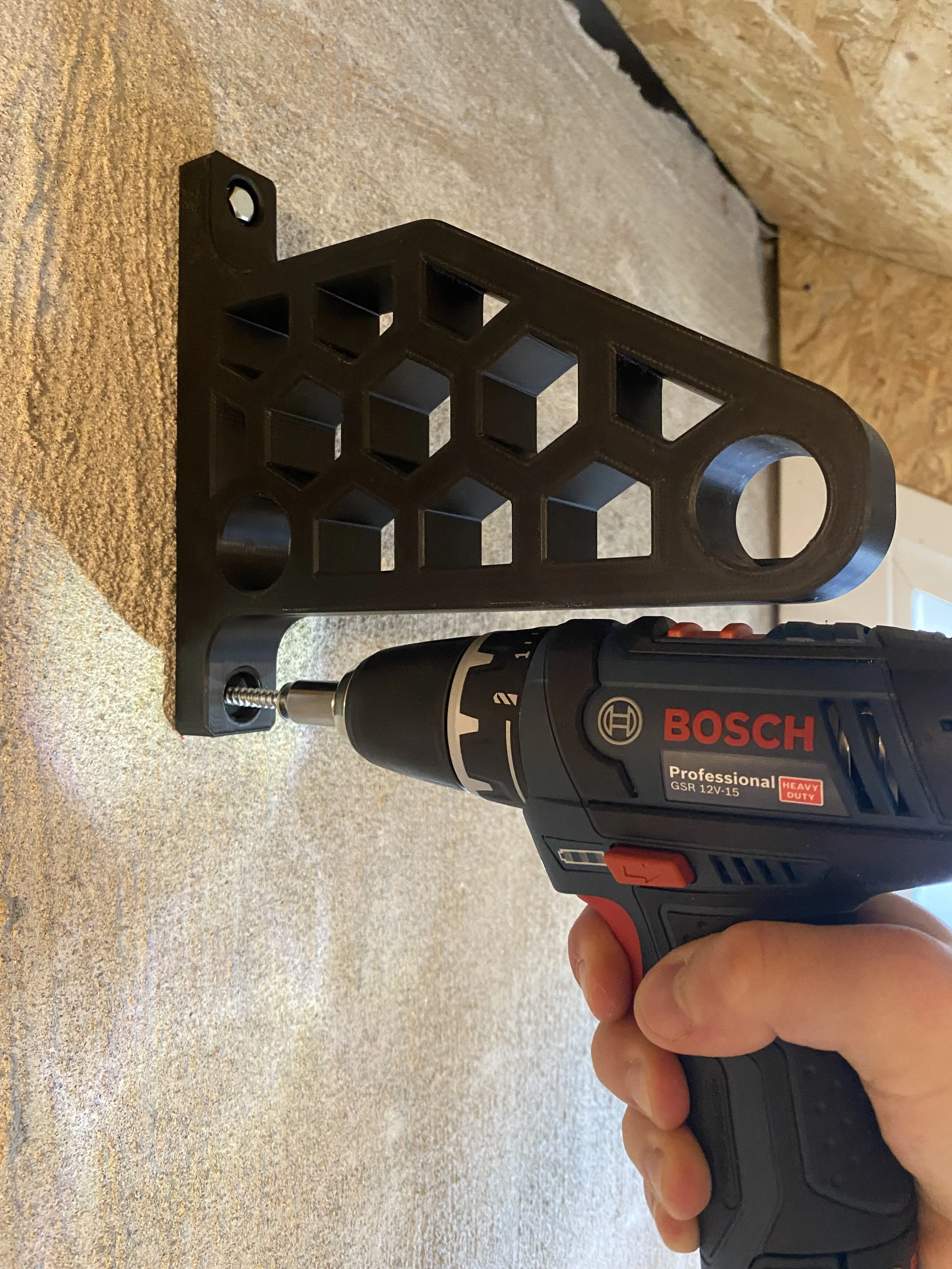 Insert the screw using a suitable socket.