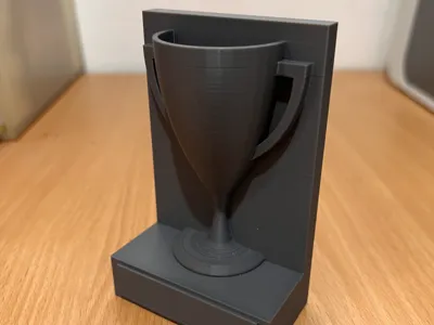 Trophy cup on back board. No supports.