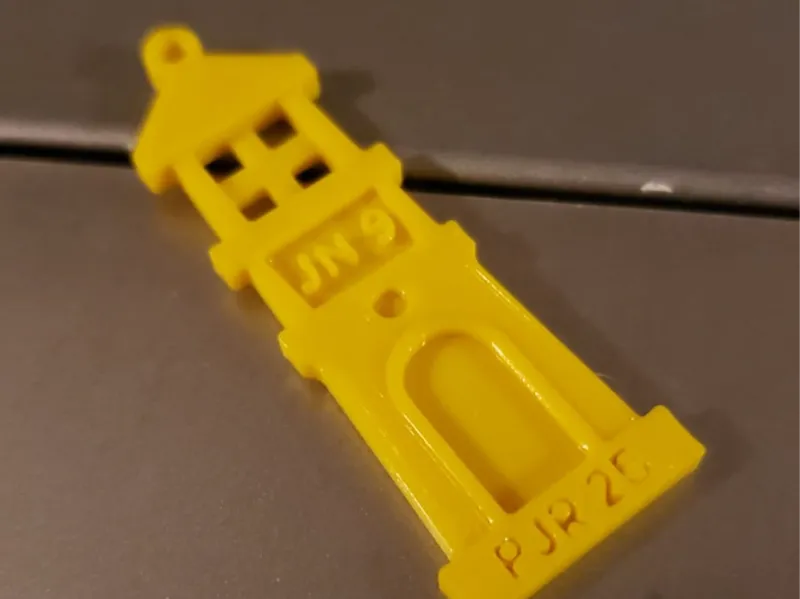Lighthouse pendant with 'John 9' engraving