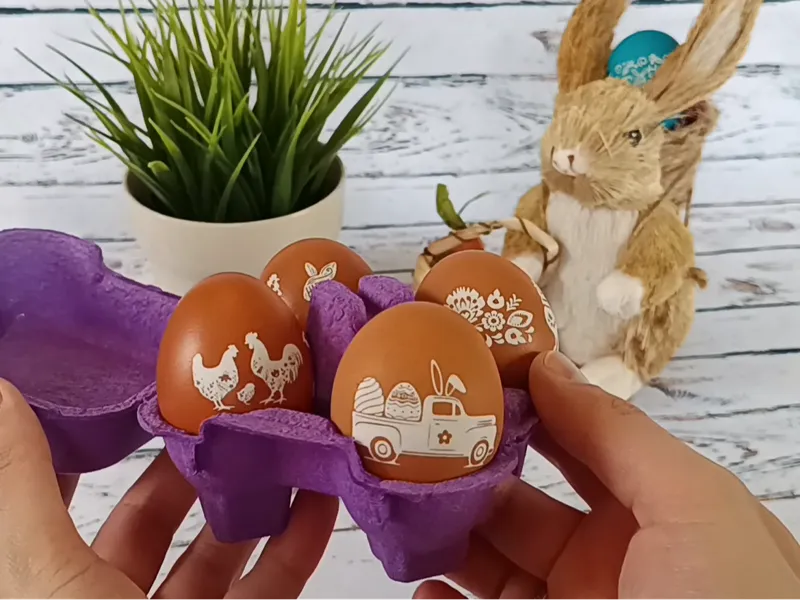 Egg holder for rotary laser engraving