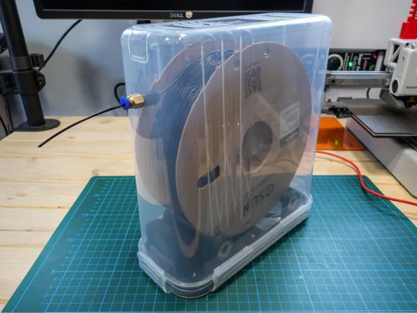 Boîte hermétique compacte pour bobine avec déshydratant