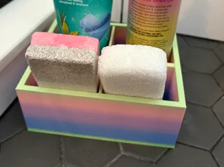 Shower organizer with draining holes