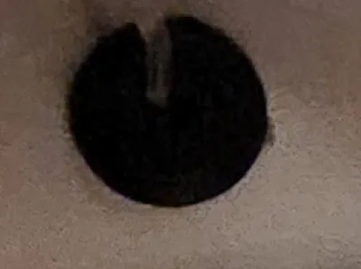 Blind string securing pin