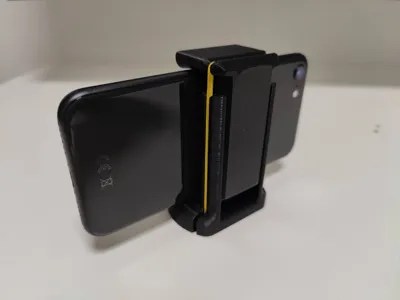 Phone holder for a tripod