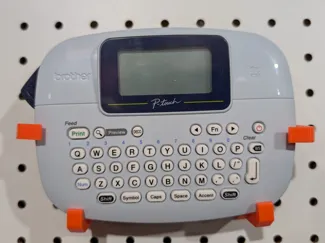 Peg board holder for P Touch PT-M95 label maker