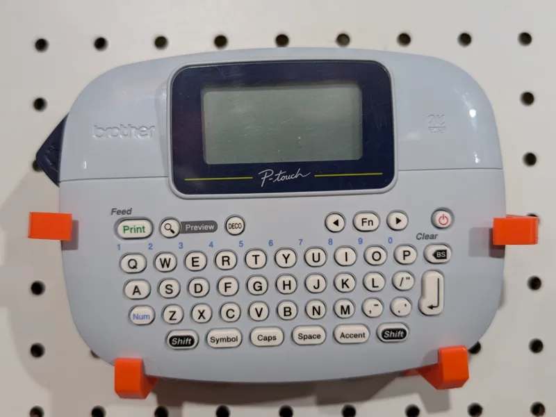 Peg board holder for P Touch PT-M95 label maker