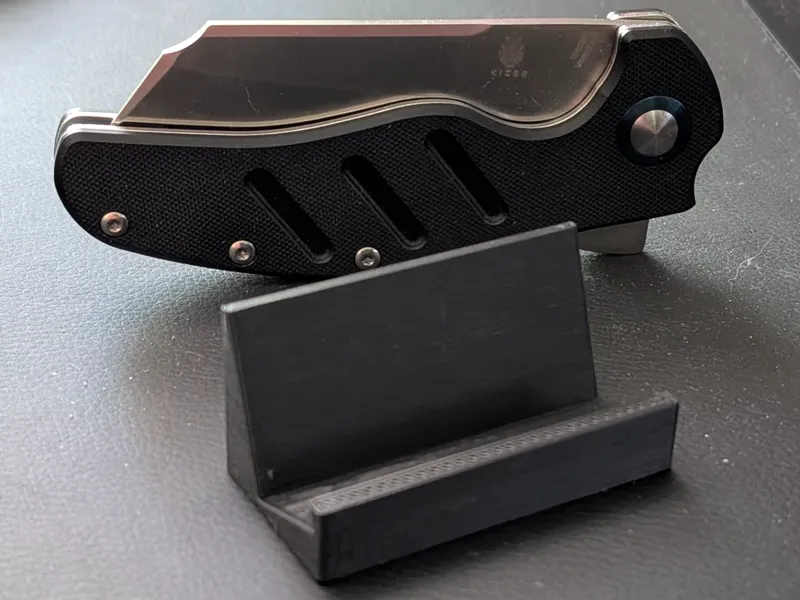 Folding pocket knife stand for larger knives