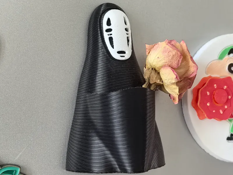 无脸男捧花冰箱贴