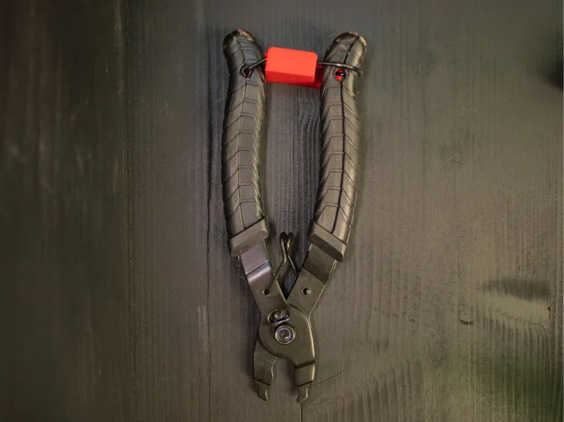Bracket for quick release clamp, bicycle chain