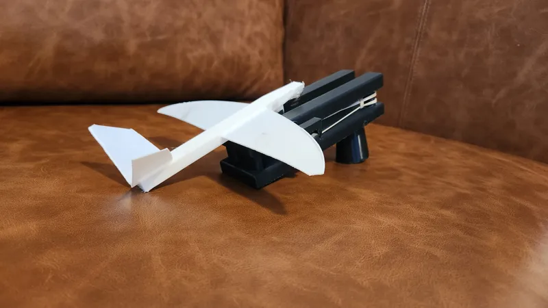 Glider with print in place handheld launcher
