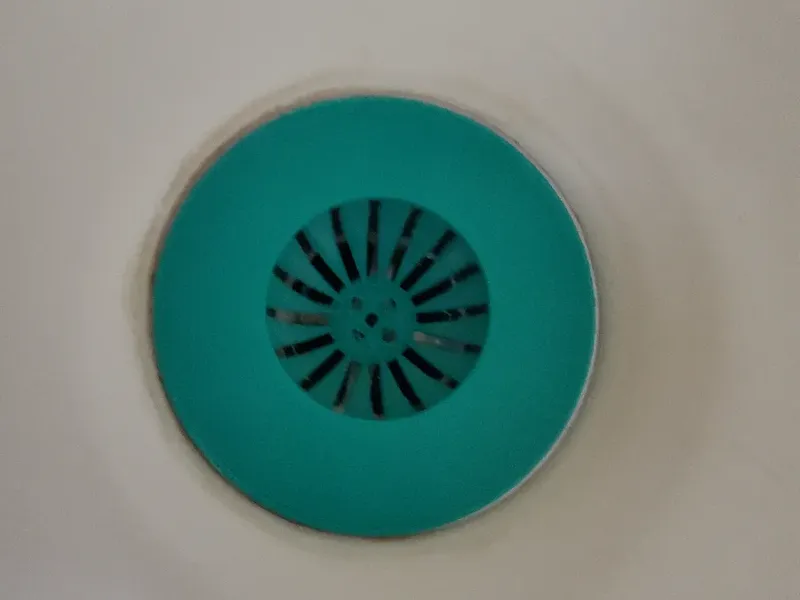 Bathtub drain hair strainer/hair catch