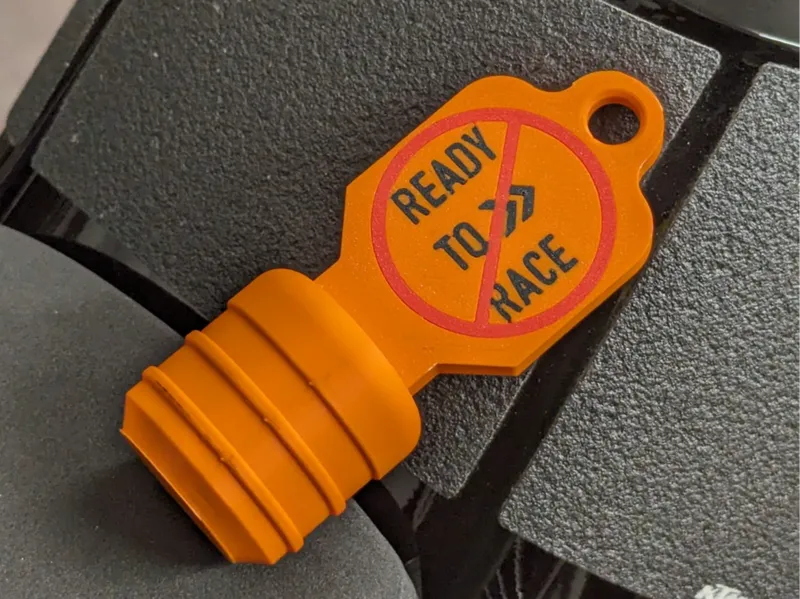 KTM SuperDuke storage/wash exhaust plug