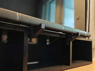Soundbar TV-Stand mount with an adjustable clamp