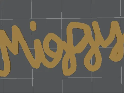 Miggy In cursive