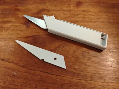 OTF spring knife using Olfa CK2 grafting blades