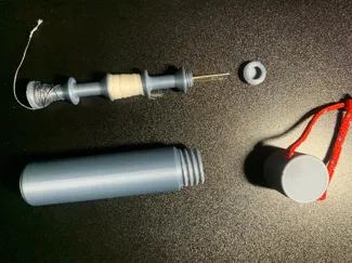Portable Sewing kit with lanyard hole 