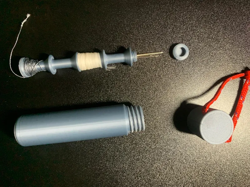 Portable Sewing kit with lanyard hole 