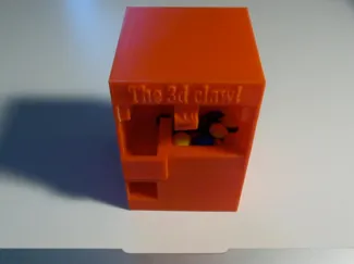 Candy claw machine, but the claw is an extruder!