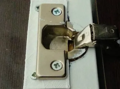 Piece to fix hinges