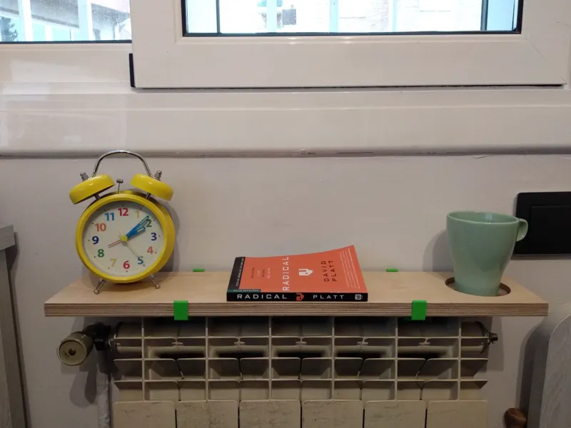 Wood support for radiator