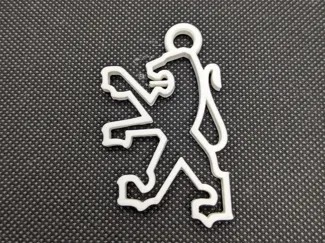 Porte clef logo lion Peugeot Année 80