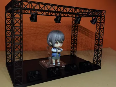 Interchangeable backdrop stage display stand