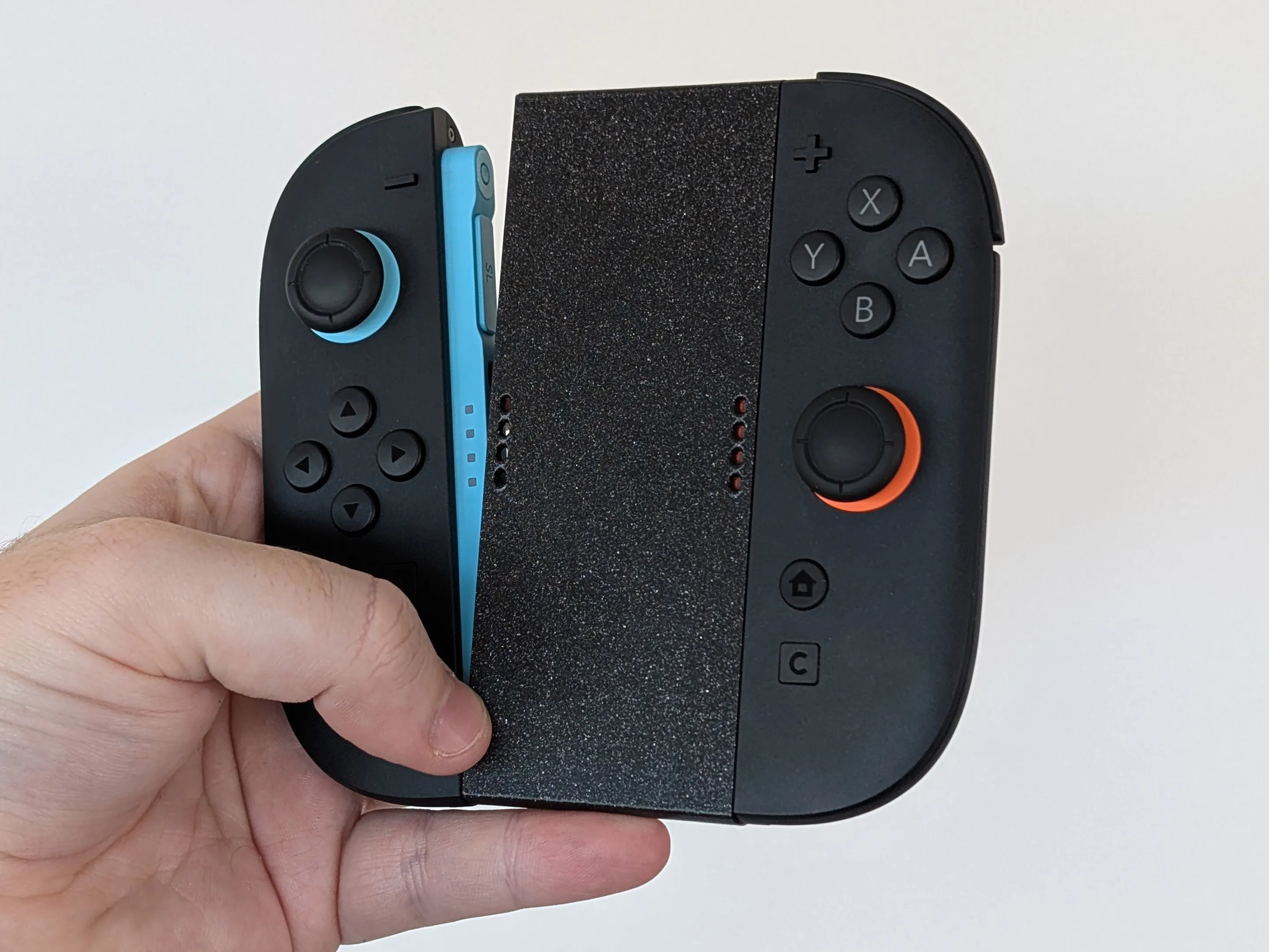 Simple Grip for Joy-Con 2 Controllers - Free 3D Print Model - MakerWorld
