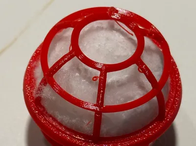 Filter media housing for 40mm diameter filter balls