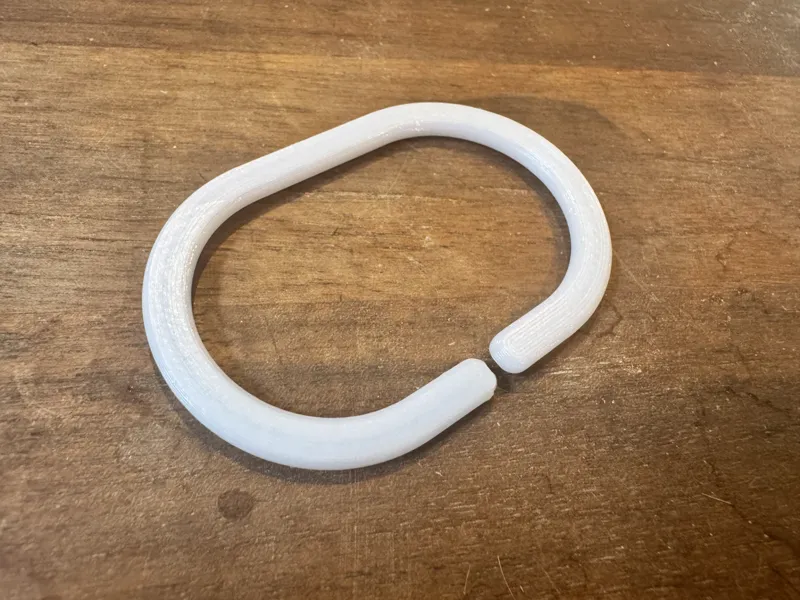 Shower curtain ring