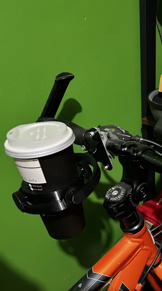 Bicycle handle bar adaptor to gyro cup holder