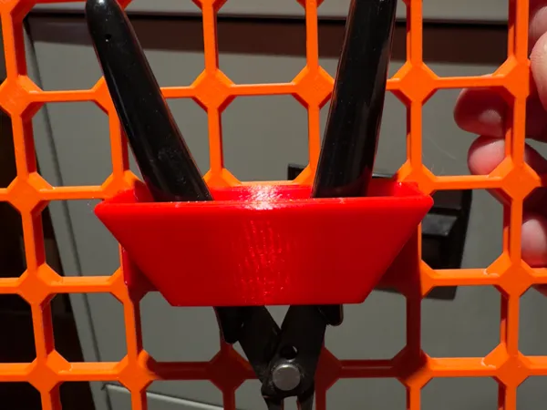 Porte-pinces pour système OpenGrid