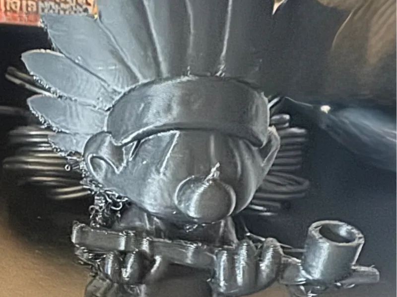 Indianerschlumpf mit Friedenspfeife
