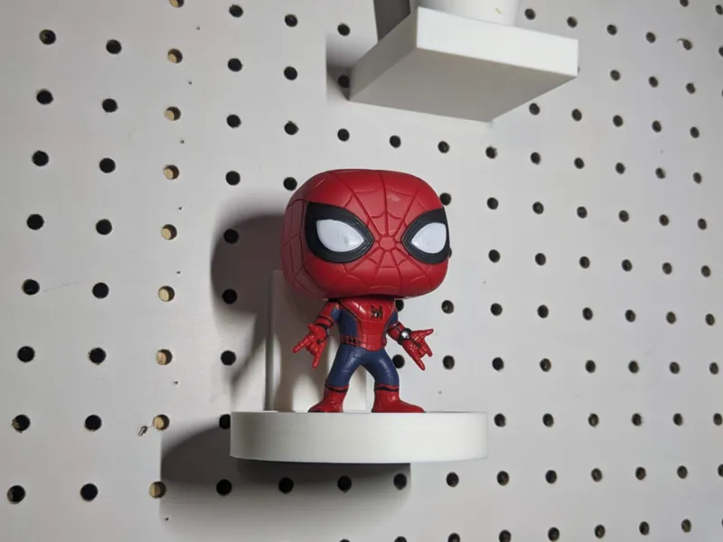 Pop figure shelf for pegboard